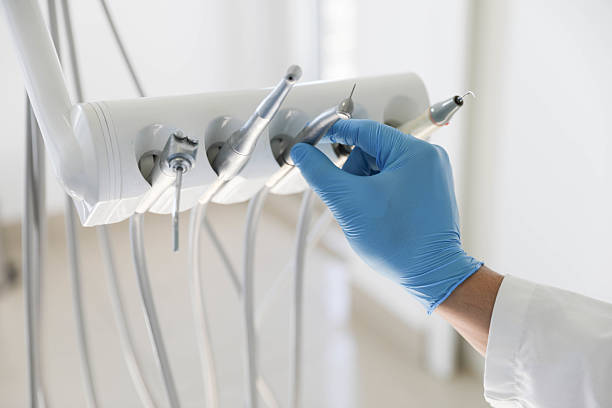 Professional Tooth Extraction technician working in Ironwood, MI